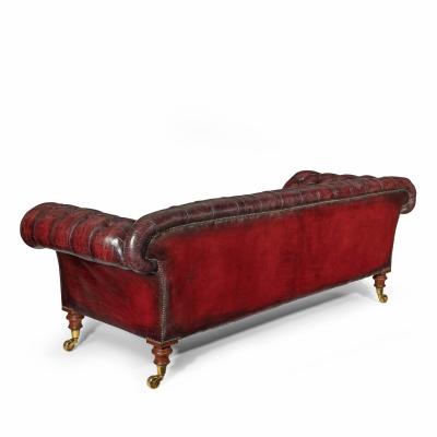 A Victorian deep buttoned Chesterfield settee