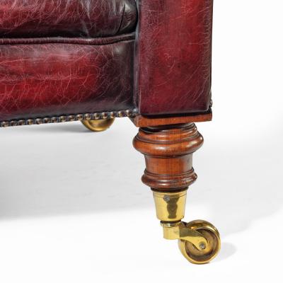 A Victorian deep buttoned Chesterfield settee