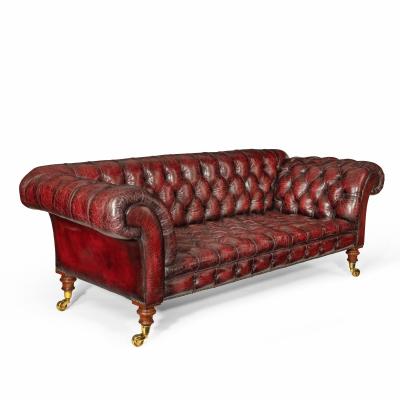 A Victorian deep buttoned Chesterfield settee