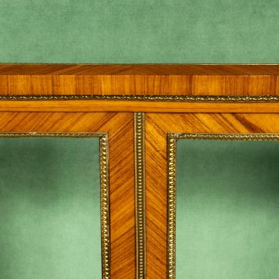 A Victorian kingwood display cabinet in French taste