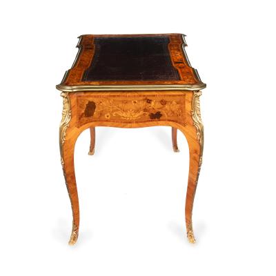 A Victorian kingwood marquetry writing table in the French taste