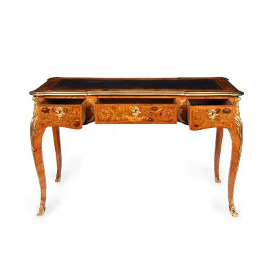 A Victorian kingwood marquetry writing table in the French taste