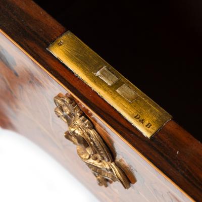 A Victorian kingwood marquetry writing table in the French taste