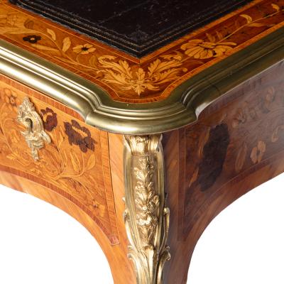A Victorian kingwood marquetry writing table in the French taste