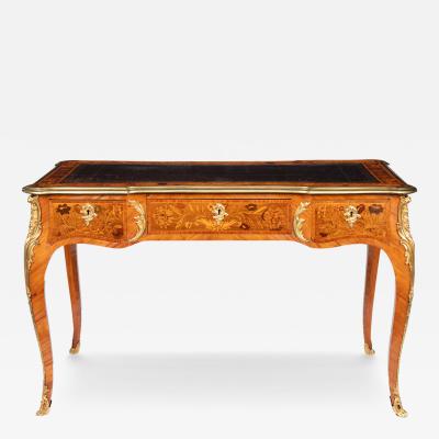 A Victorian kingwood marquetry writing table in the French taste