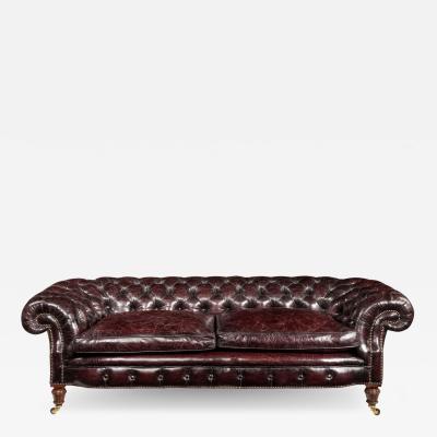 A Victorian walnut Chesterfield sofa