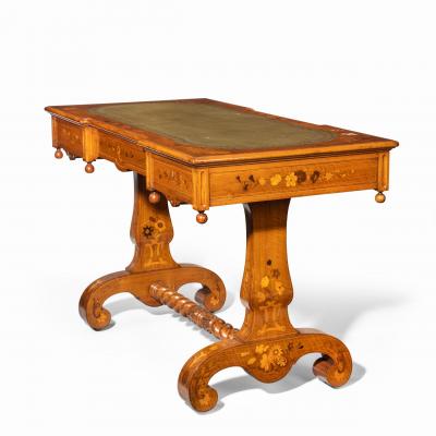 A Victorian walnut marquetry writing table attributed to Edward Holmes Baldock