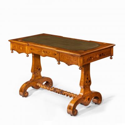 A Victorian walnut marquetry writing table attributed to Edward Holmes Baldock