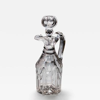 A WILLIAM IV ARMOURIAL CLARET JUG