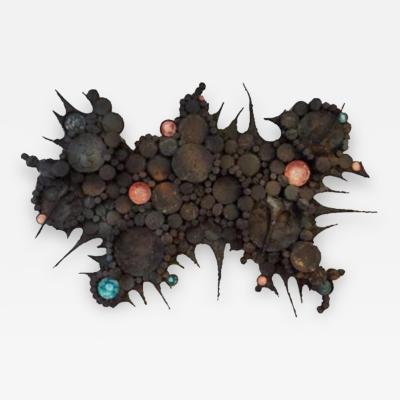 A Wall Sculpture in Blackened Steel and Ceramic