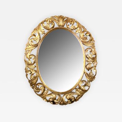 A Well Carved Italian Baroque Style Oval Gilt Wood Mirror