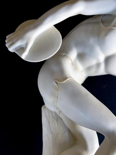 A Well defined Italian Bisque Figure of a Discus Thrower