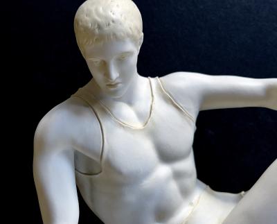 A Well defined Italian Bisque Figure of a Discus Thrower