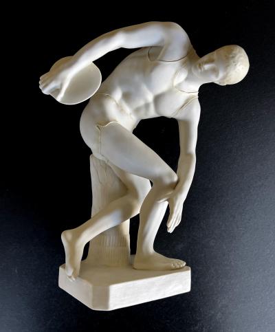 A Well defined Italian Bisque Figure of a Discus Thrower