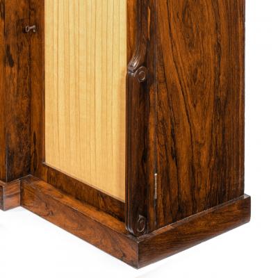 A William IV rosewood breakfront side cabinet