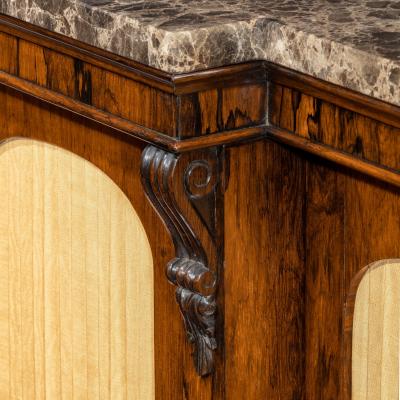 A William IV rosewood breakfront side cabinet