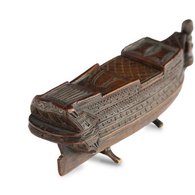A carved boxwood prisoner of war battleship snuff box