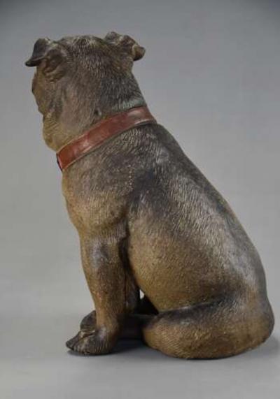 A charming late 19th century Austrian seated terracotta Pug dog