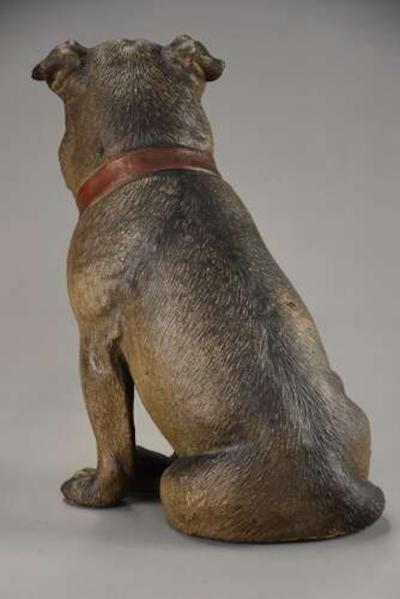 A charming late 19th century Austrian seated terracotta Pug dog