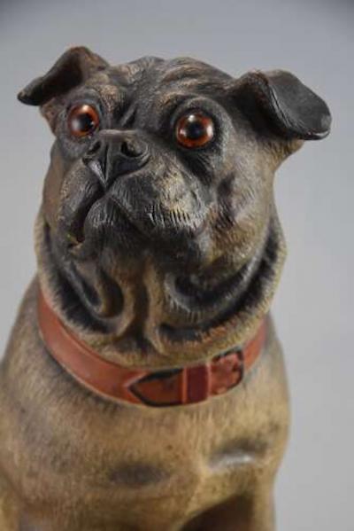 A charming late 19th century Austrian seated terracotta Pug dog