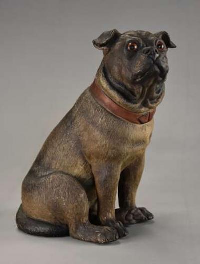 A charming late 19th century Austrian seated terracotta Pug dog