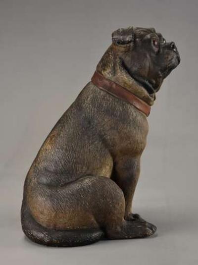 A charming late 19th century Austrian seated terracotta Pug dog