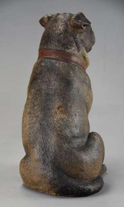 A charming late 19th century Austrian seated terracotta Pug dog