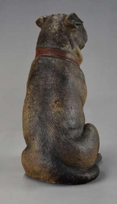 A charming late 19th century Austrian seated terracotta Pug dog