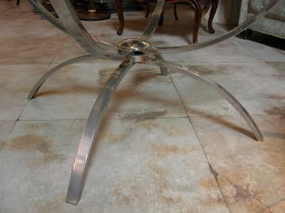 A chic Italian 1960s nickel plated cocktail table with glass top