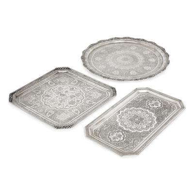 A collection of Persian silverware and tableware