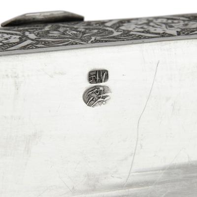 A collection of Persian silverware and tableware