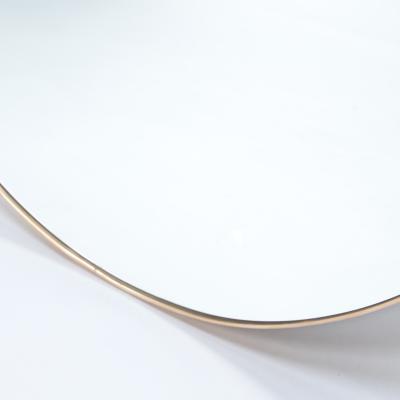 A contemporary Italian large round brass mirror 21st Century 