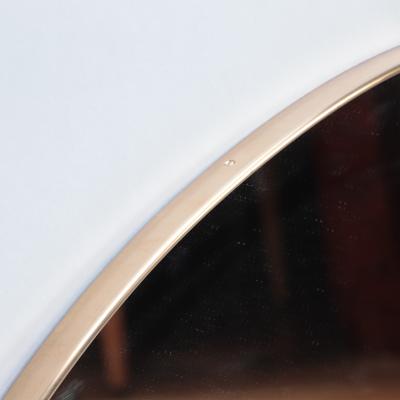 A contemporary Italian large round brass mirror 21st Century 