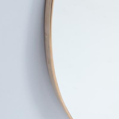 A contemporary Italian large round brass mirror 21st Century 