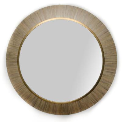 A contemporary modernist round mirror executed in meticulous straw marquetry 
