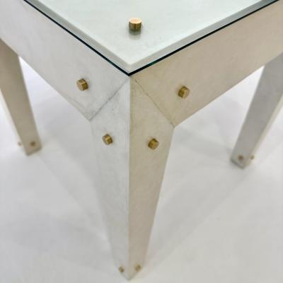 A contemporary pair of side tables in the manner of Jean Michel Frank France 