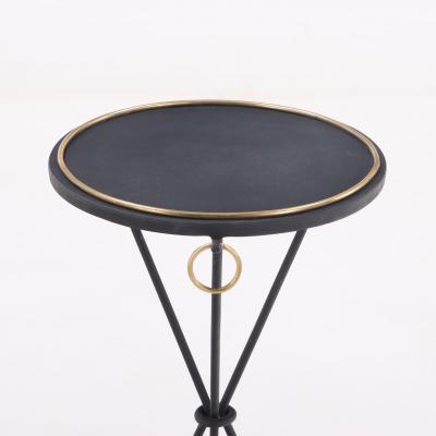 A contemporary pair of wrought iron drink tables having ring decoration 