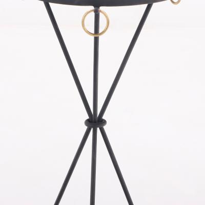 A contemporary pair of wrought iron drink tables having ring decoration 