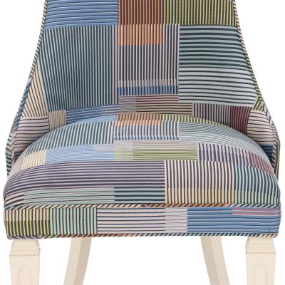 A contemporary tall back side chair covered in Paul Smith fabric 