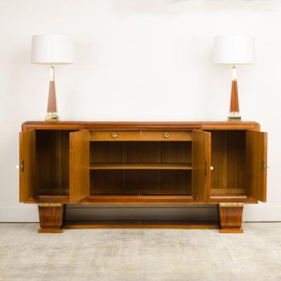 A fine French 1940s walnut veneer with gilded carved wood details sideboard