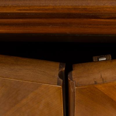 A fine French 1940s walnut veneer with gilded carved wood details sideboard