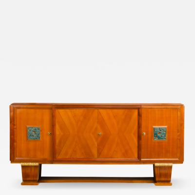 A fine French 1940s walnut veneer with gilded carved wood details sideboard