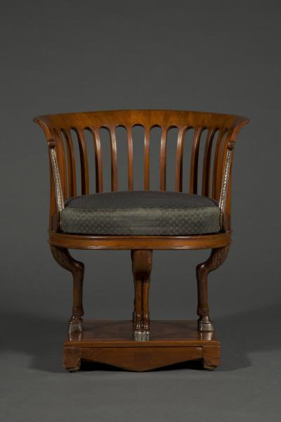 A fine and unusual neoclassical mahogany and silvered bronze