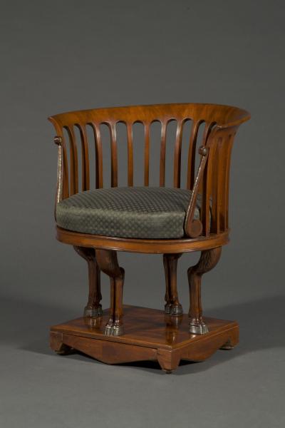 A fine and unusual neoclassical mahogany and silvered bronze