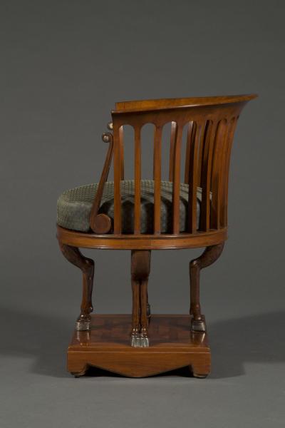 A fine and unusual neoclassical mahogany and silvered bronze