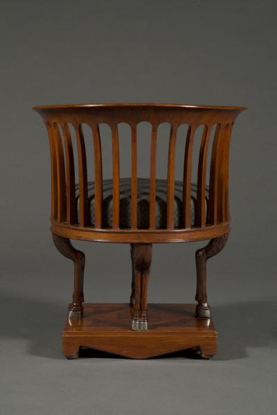 A fine and unusual neoclassical mahogany and silvered bronze