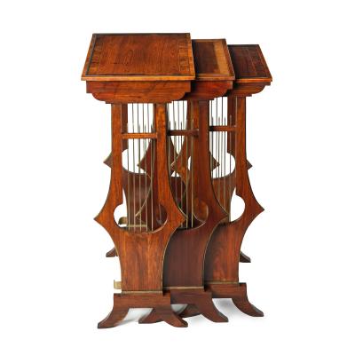A fine and unusual nest of three Regency tables