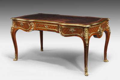 A fine kingwood and marquetry bureau plat in the French taste
