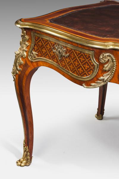 A fine kingwood and marquetry bureau plat in the French taste