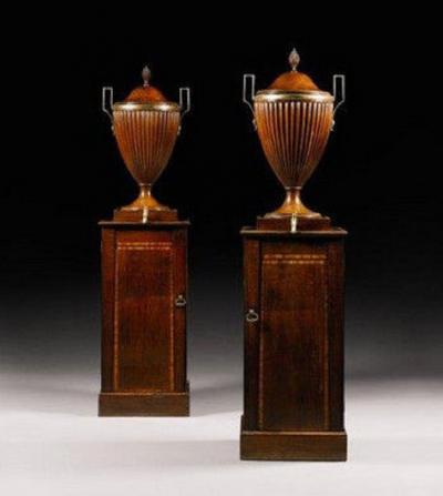 A fine pair of George III mahogany wine cisterns attributed to Gillows